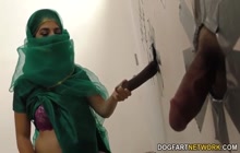 Arab chick taking cocks through gloryholes